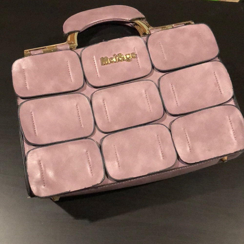 Used lavender handbag